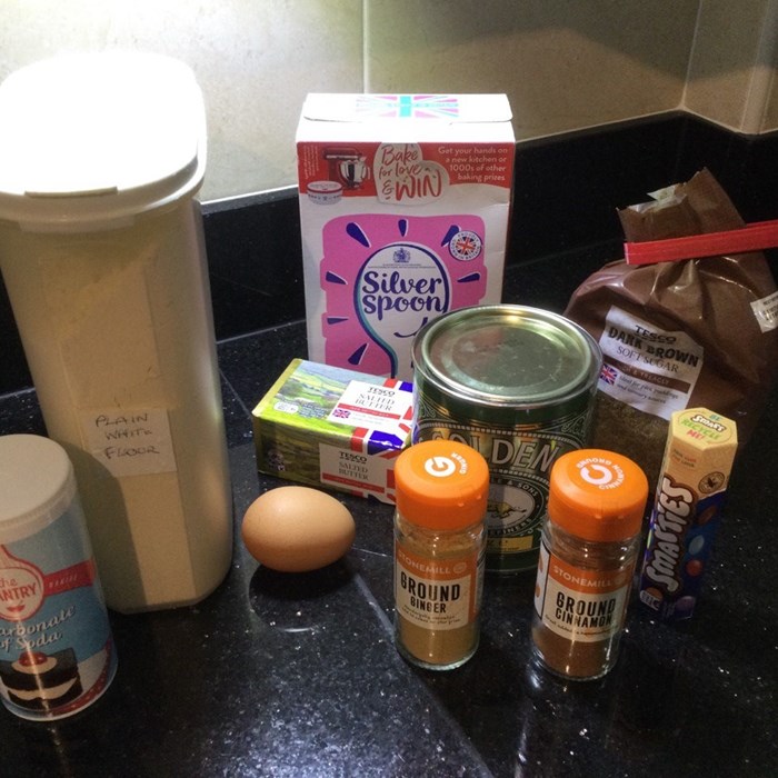 A selection of baking ingredients on the kitchen countertop.